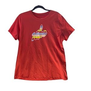 The Nike Tee short sleeve  size large with colorful Nike graphic on front